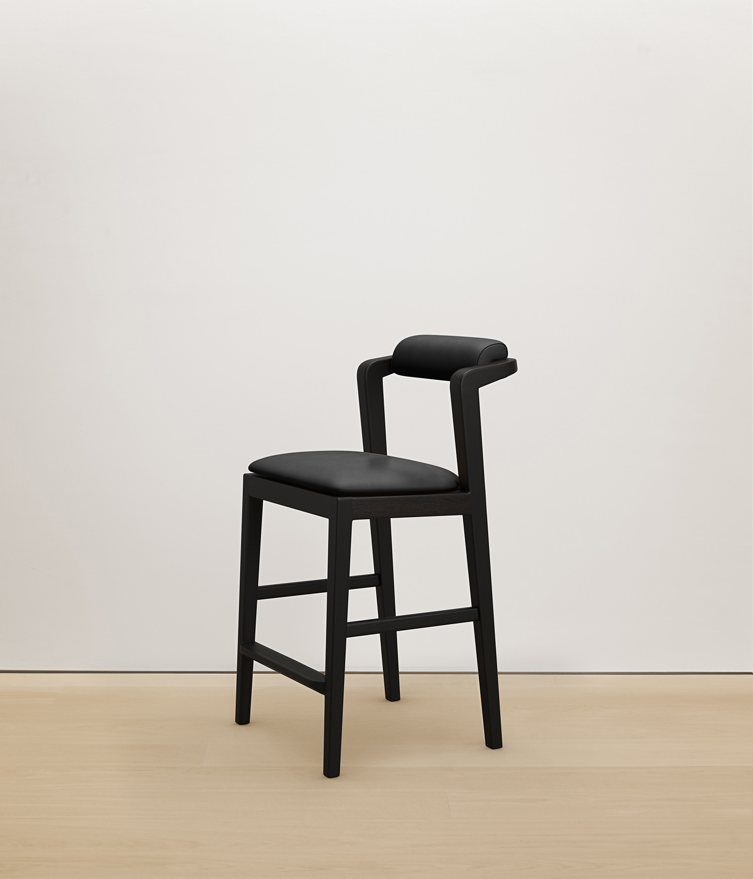  black-stained-oak stool with black color upholstered seat