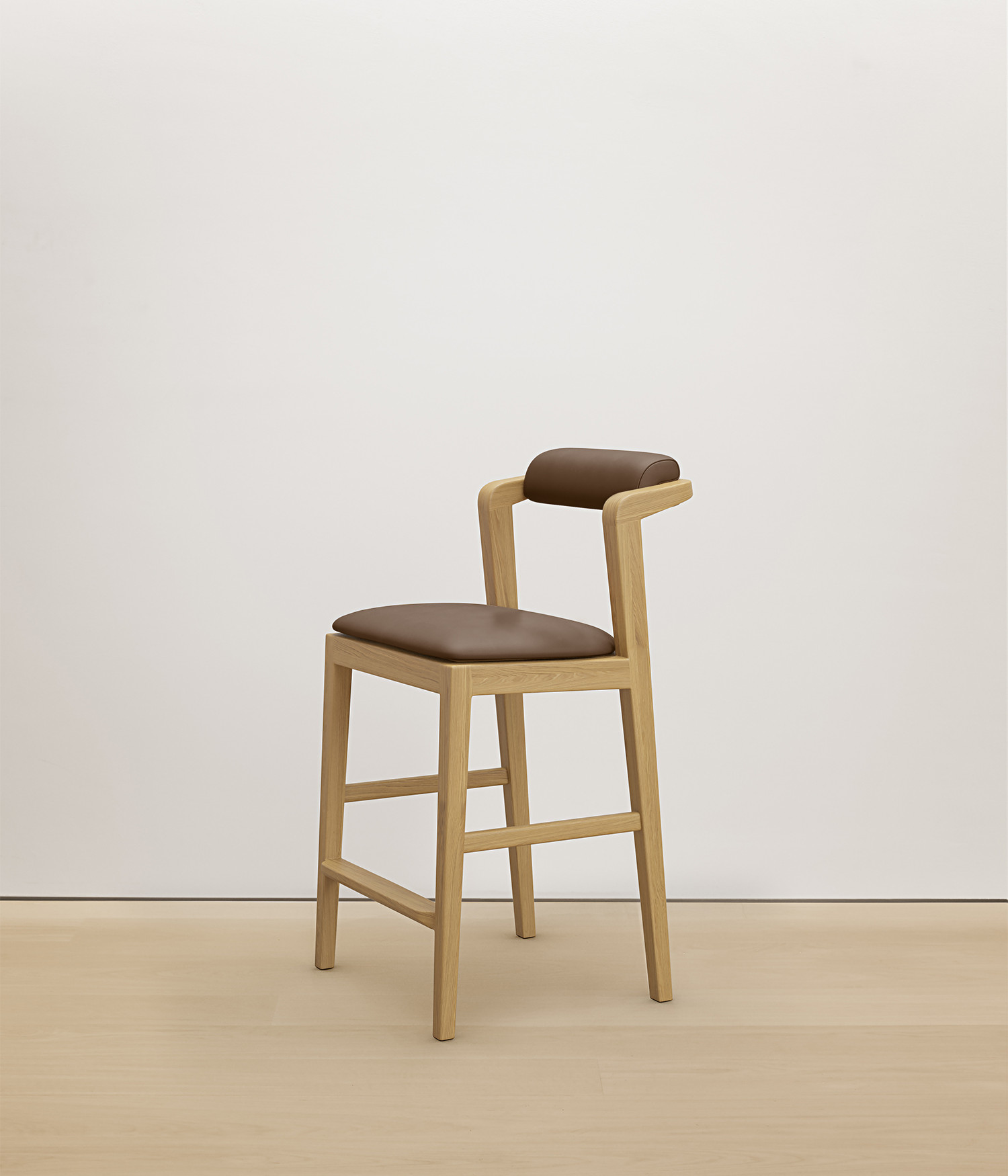  white-oak stool with umber color upholstered seat