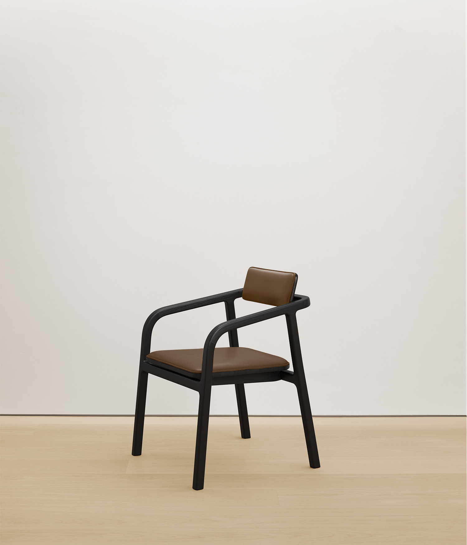  black-stained-oak chair with umber color upholstered seat