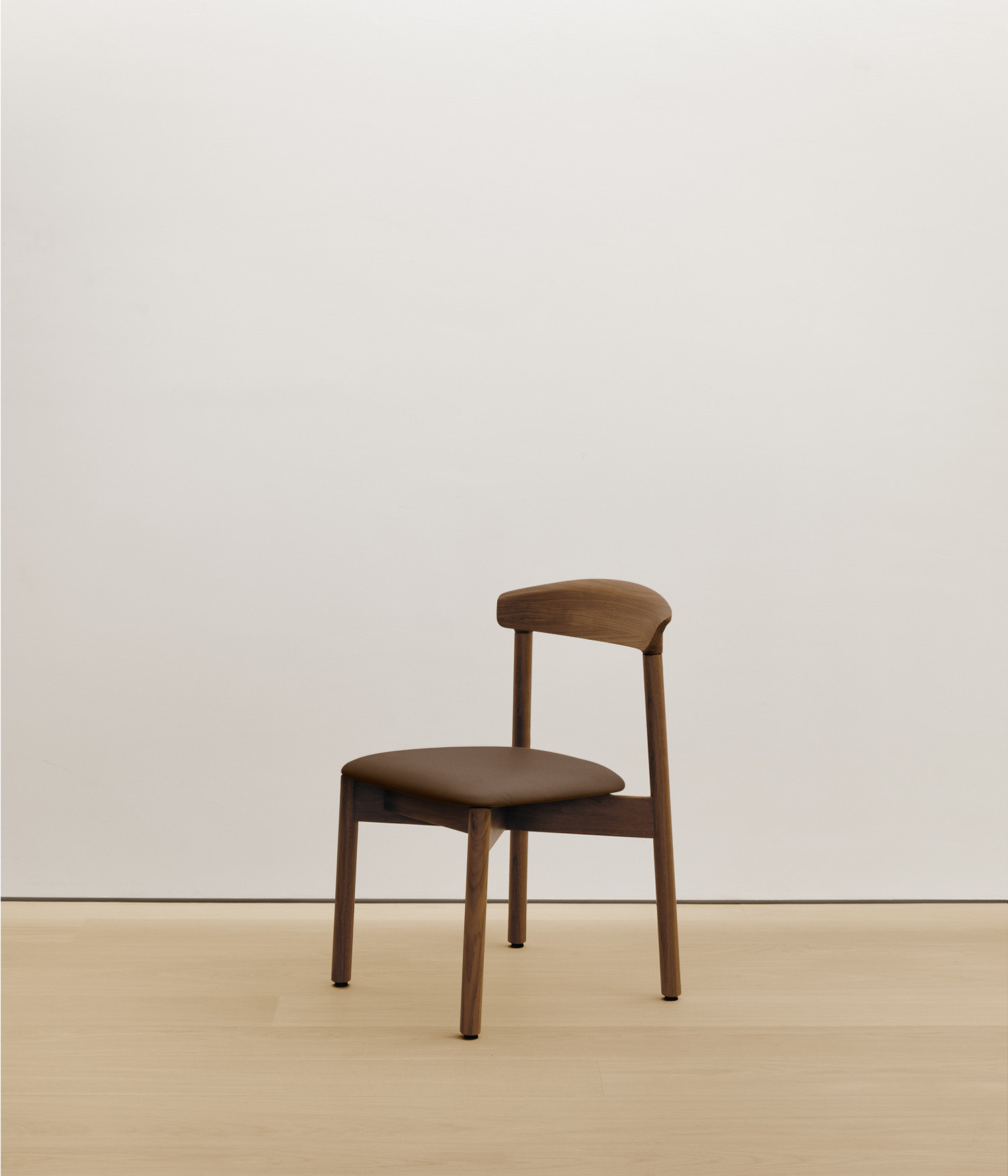  walnut chair with umber color upholstered seat