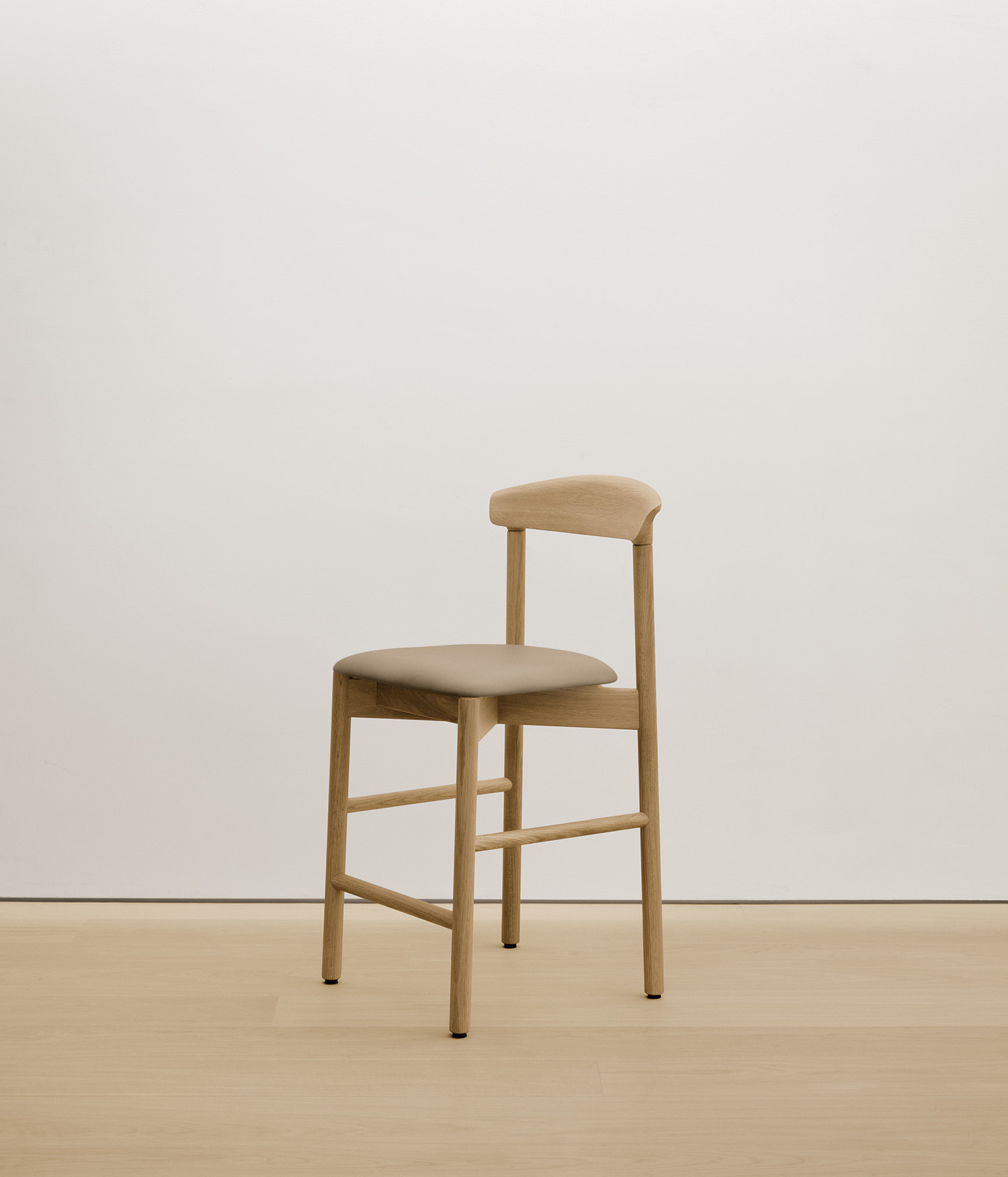  white-oak stool with cream color upholstered seat 